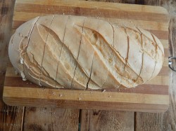 название картинки Батон с чесноком в духовке