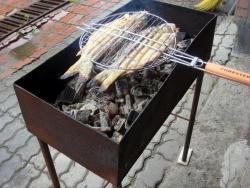 название картинки Рыба на костре на решетке на углях