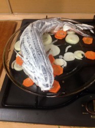 Белый амур запеченный в духовке фаршированный