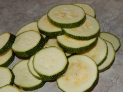 Кабачки с помидорами и чесноком в духовке