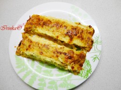 Рулетики из кабачков с куриным филе и овощами в духовке