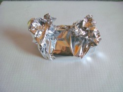 название картинки Свиная котлета на косточке запечённая в фольге