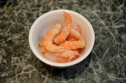 название картинки Креветки в кляре на сковороде