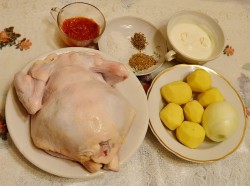 название картинки Курица фаршированная картошкой в духовке в рукове