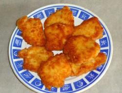 название картинки Куриные грудки в панировке на сковороде