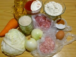 название картинки Ленивые голубцы с рисом капустой и фаршем в кастрюле