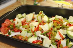 Филе минтая в духовке с овощами запеченное