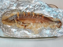 Осетр в духовке целиком