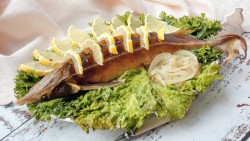 Осетр в духовке целиком