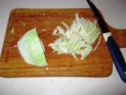 название картинки Пирожки из дрожжевого теста с капустой в духовке