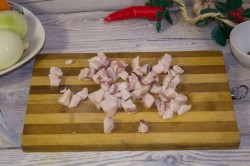 Плов со свининой в казане на плите