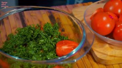 Помидоры с зеленью и чесноком в томатной заливке