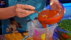 Помидоры с зеленью и чесноком в томатной заливке