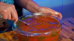 Помидоры с зеленью и чесноком в томатной заливке