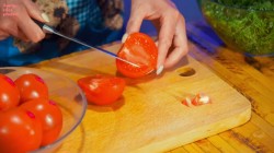 Помидоры с зеленью и чесноком в томатной заливке