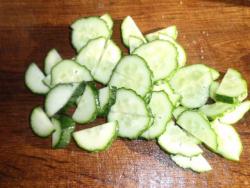 Салат с вареной рыбой, огурцами, редисом