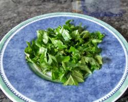 название картинки Тушеные помидоры с чесноком и луком